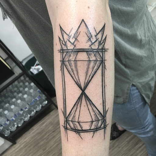 Explore wedding ring tattoo cover up ideas, creative tattoo ideas in Portland, available at Obsidian Tattoo