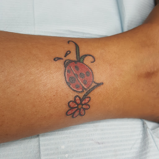 Tattoo Shop «Red Octopus Tattoos & Body Piercings», reviews and photos, 7465 Annapolis Rd, Hyattsville, MD 20784, USA