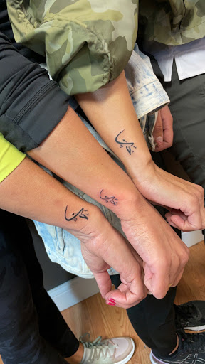 Explore small watercolor tattoo ideas, creative tattoo ideas in Farmington, available at TATTOO 13 & Laser Tattoo Removal