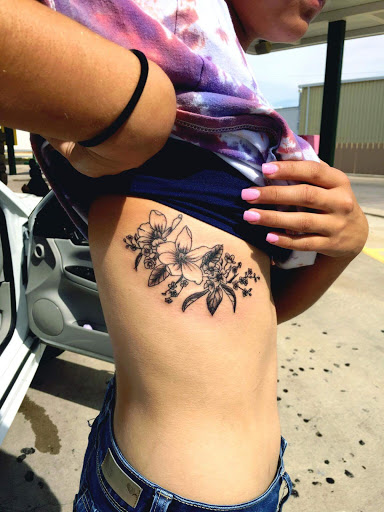 Explore sunflower and butterfly tattoo ideas, creative tattoo ideas in Odessa, available at Little Dragon Tattoos Studio