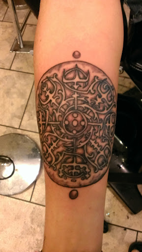 Explore revenge tattoo ideas, creative tattoo ideas in Pikeville, available at The Carbon Canary Tattoo Studio