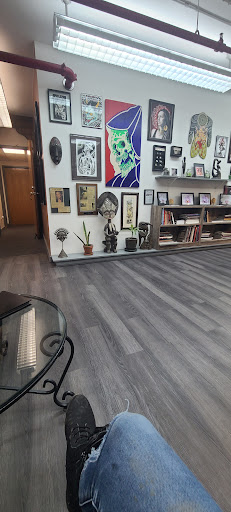 Explore hood neck tattoo ideas, creative tattoo ideas in Syracuse, available at Scarab Body Arts