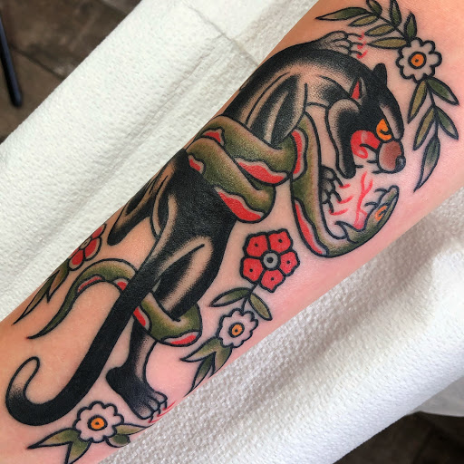 Explore blacklight tattoo ideas, creative tattoo ideas in Lakeland, available at Black Swan Tattoo