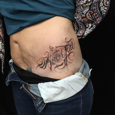 Fond Noir Tattoo à Toulouse