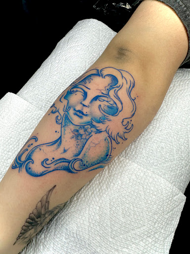 Explore middle arm tattoo ideas, creative tattoo ideas in Southampton, available at Le Uke Tattoo Studio