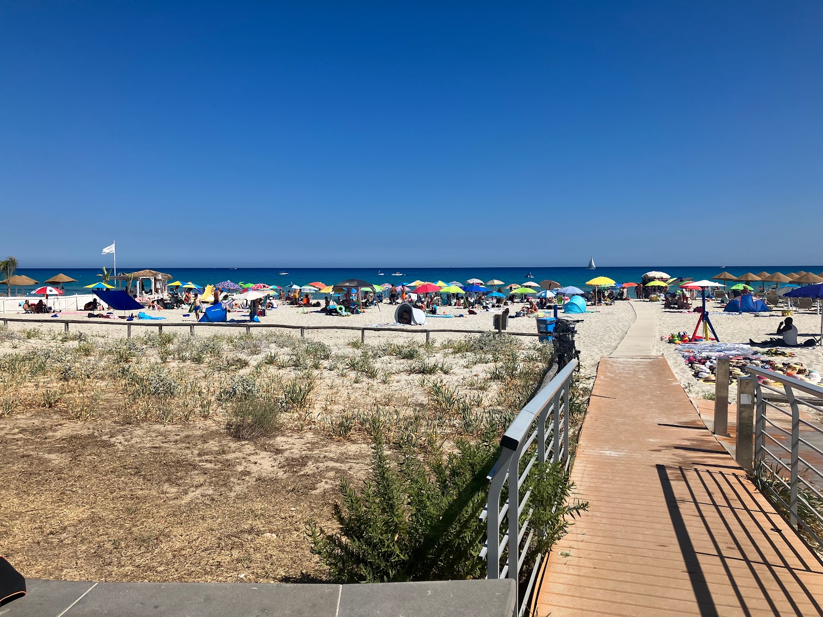 Simius Beach'in fotoğrafı düz ve uzun ile birlikte