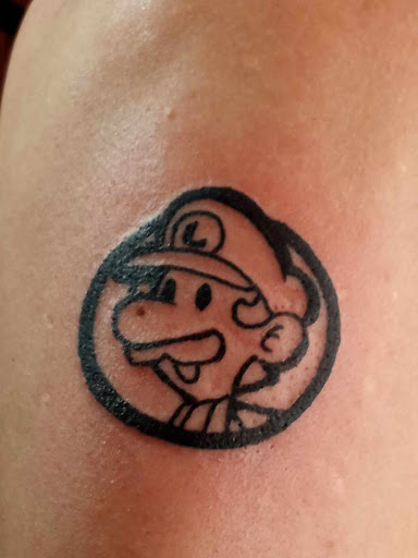 Explore cover up star tattoo ideas, creative tattoo ideas in Dunn, available at Yankee Tattoo and Piercing