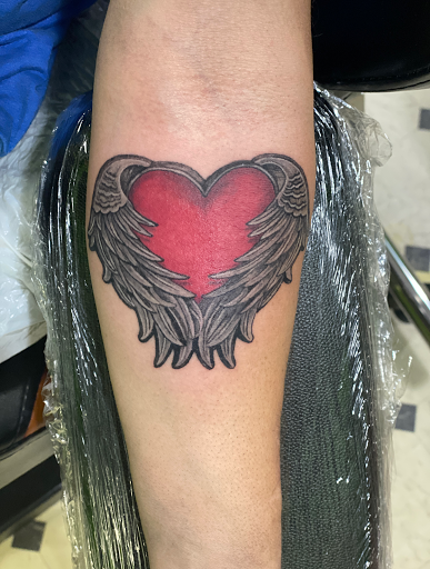 Explore ruby tattoo ideas, creative tattoo ideas in Evansville, available at Ink Therapy 101