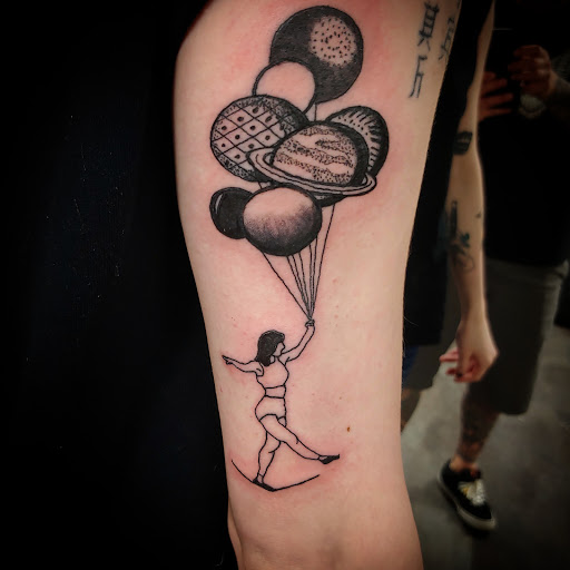 Explore two face tattoo ideas, creative tattoo ideas in Gadsden, available at Sacred Art Tattoo Company
