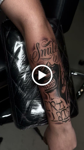 Explore money bag tattoo ideas, creative tattoo ideas in San Diego, available at Wylde Sydes Tattoo & Body Piercing