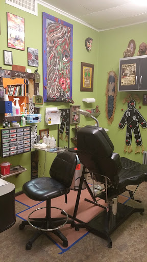 Find owl tattoo ideas for guys for your next unique tattoo in Storm Lake at Alley Cat Tattoo