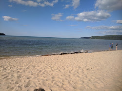 Photo of Sand Point Beach and the settlement