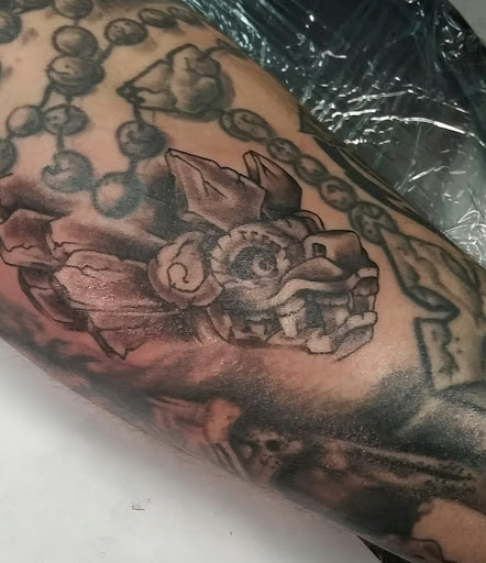 Explore tattoo ideas for outer forearm, creative tattoo ideas in Brunswick, available at Blue Fin Tattoos