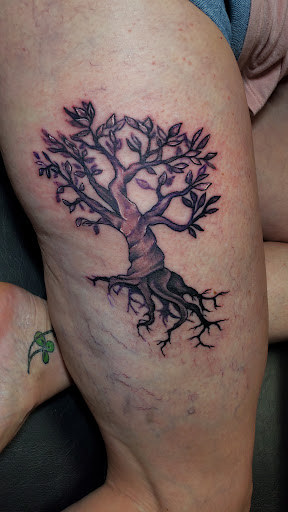 Explore peck tattoo ideas, creative tattoo ideas in San Tan Valley, available at San Tan Tattoo