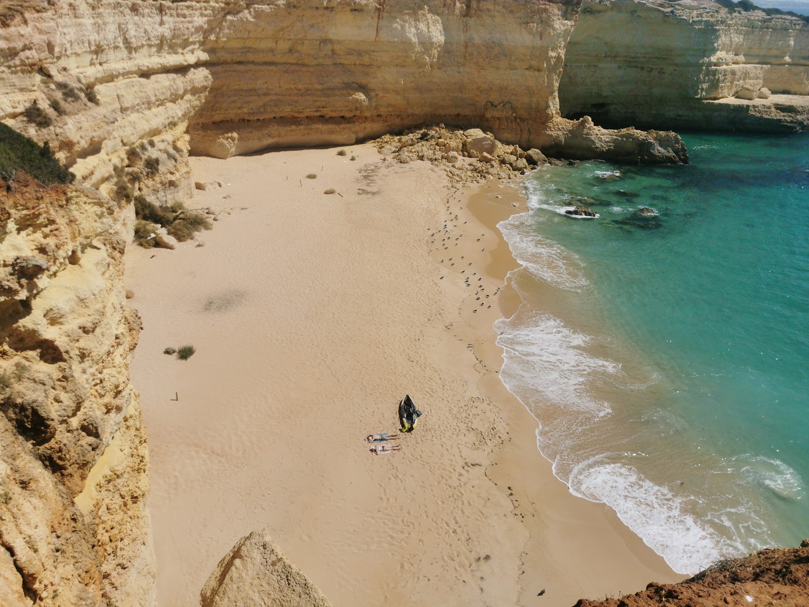 Fotografija Praia do Pontal z fino rjavi pesek površino