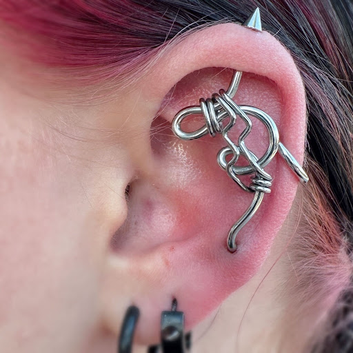 Explore e.t. tattoo ideas, creative tattoo ideas in Albuquerque, available at Evolution Body Piercing