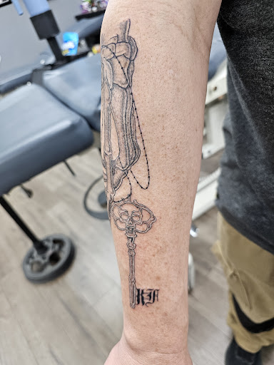 Explore mechanic tattoo ideas for guys, creative tattoo ideas in Cheyenne, available at The T.R.I.B.E. Zoo, LLC Tattoo