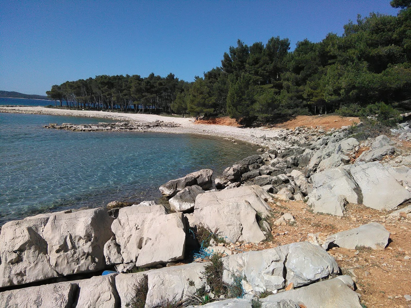 Foto di Pilatusha beach II con una superficie del ciottolame