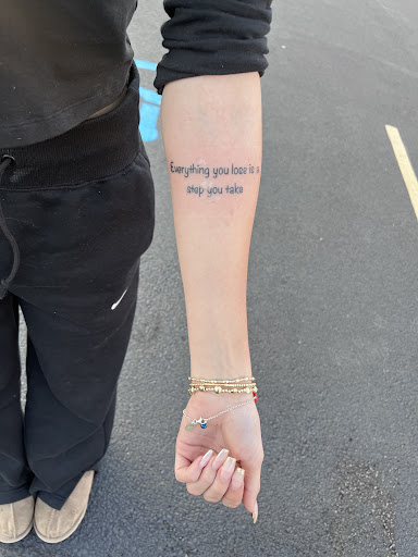 Explore color flower tattoo ideas, creative tattoo ideas in Niles, available at Blackwater Ink Tattoo studio