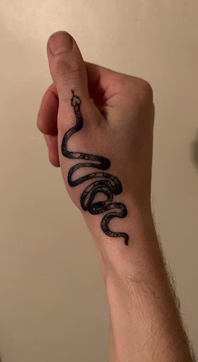 Explore wrist tattoo ideas male, creative tattoo ideas in Buffalo, available at True Gloom Tattoo Studio