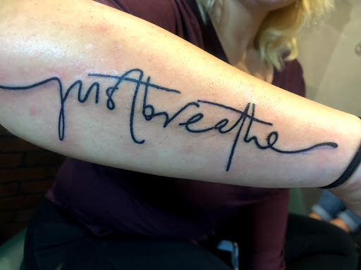 Explore good tattoo ideas for half sleeve, creative tattoo ideas in Cape Coral, available at UNRIVALED INK