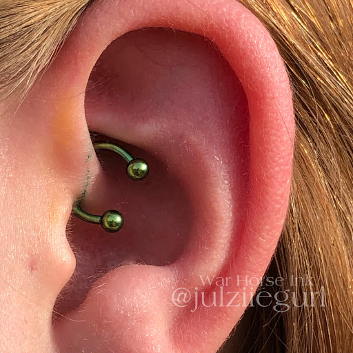 Explore simple cartoon tattoo ideas, creative tattoo ideas in Kent, available at War Horse Ink