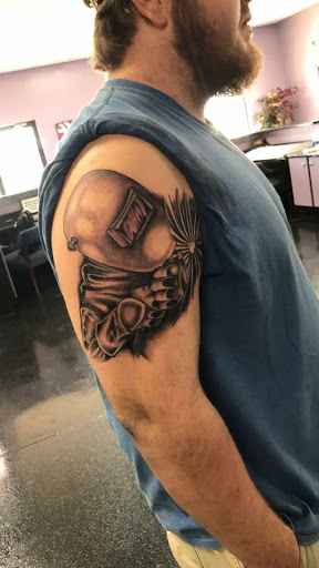 Explore stitch tattoo ideas, creative tattoo ideas in Tifton, available at Embody Art Tattoo Studio