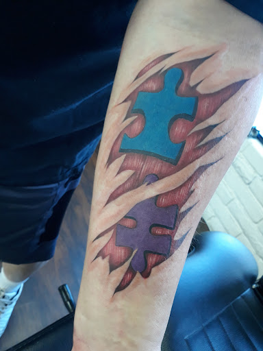 Explore tattoo ideas for dad and son, creative tattoo ideas in Mesa, available at Sea of Ink Tattoo Studio