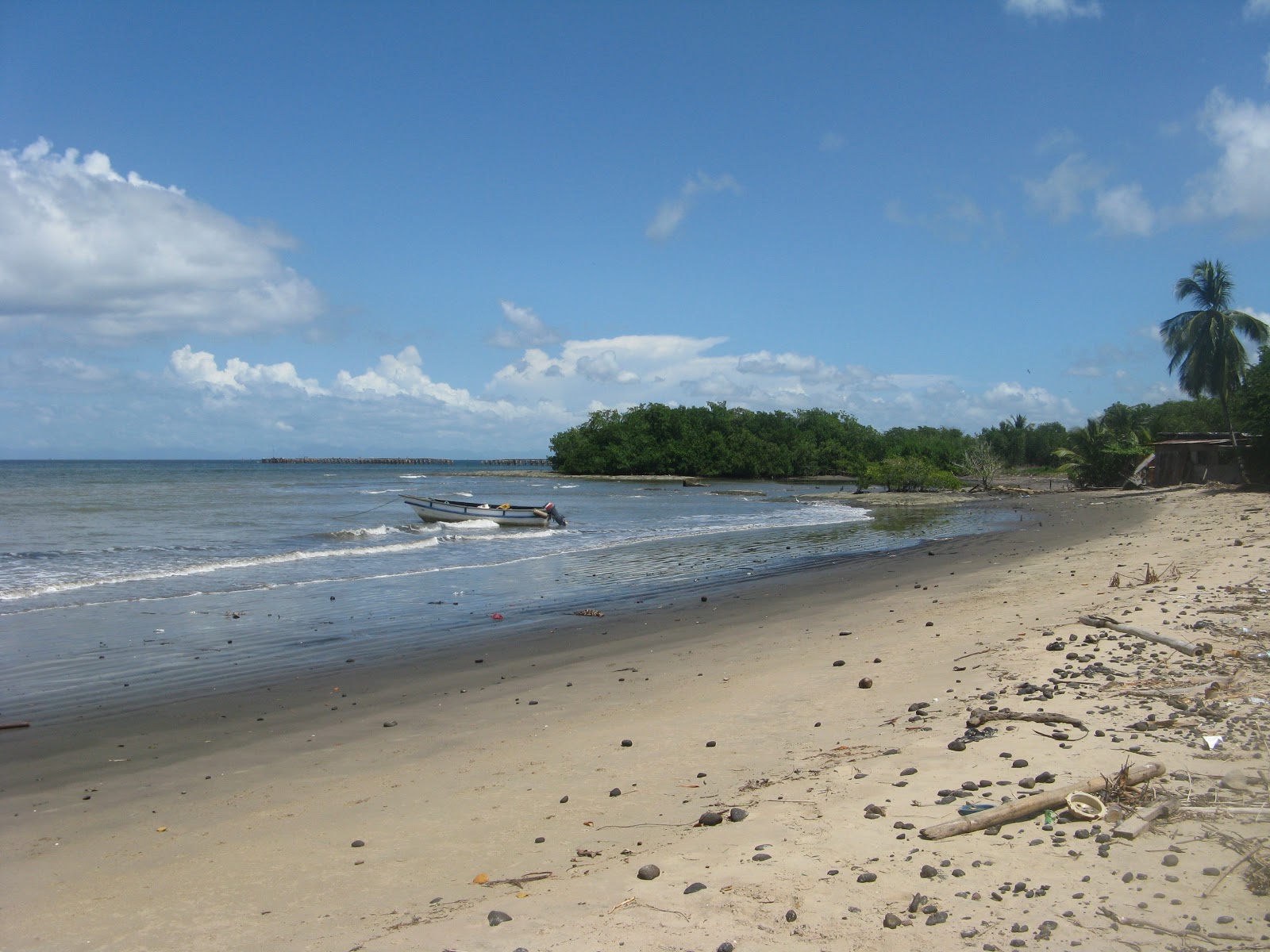 Foto van Station beach met blauw water oppervlakte