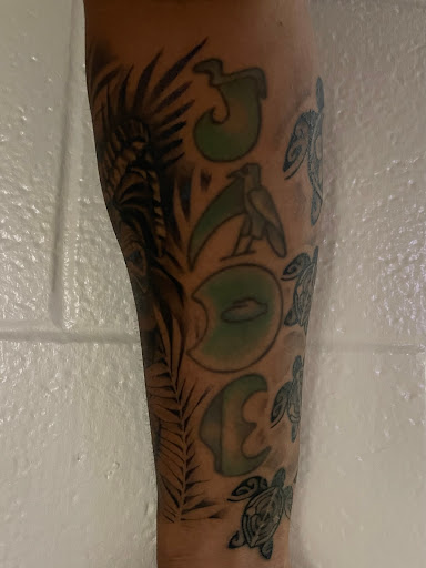 Explore guns n roses tattoo ideas, creative tattoo ideas in Kapolei, available at Sacred Art Tattoo and Coffee Bar - Kapolei