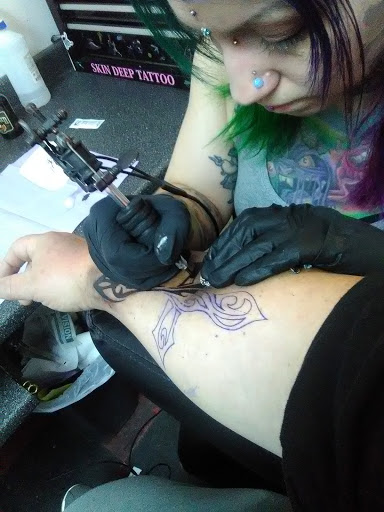 Explore black and white tattoo ideas for men, creative tattoo ideas in Durham, available at Tattoo Asylum