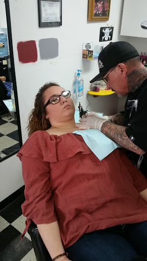 Explore back of the arm tattoo ideas, creative tattoo ideas in Harriman, available at Tattoos By Bryan