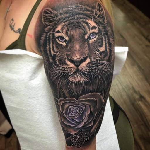 Explore john wick tattoo ideas, creative tattoo ideas in Atlanta, available at Golden Anchor Tattoo