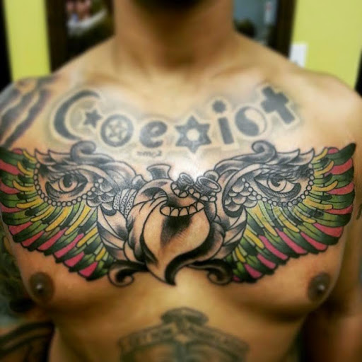 Explore spine tattoo ideas for men, creative tattoo ideas in Goose Creek, available at Blu Gorilla Goose Creek