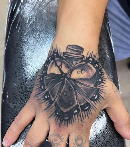 Explore under butt tattoo ideas, creative tattoo ideas in Orange, available at Ink Activitiez Tattoo