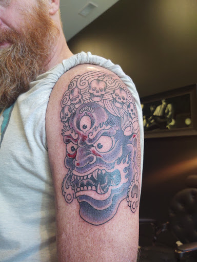 Explore black people tattoo ideas, creative tattoo ideas in Buena Vista, available at Ivy League Tattoo Studio