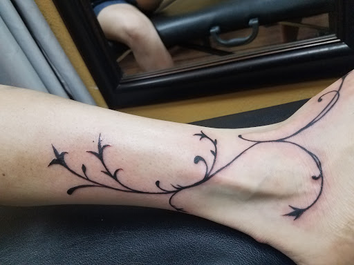 Explore god of war tattoo ideas, creative tattoo ideas in Denton, available at Lizards Ink Tattoo and piercing, Denton, tx