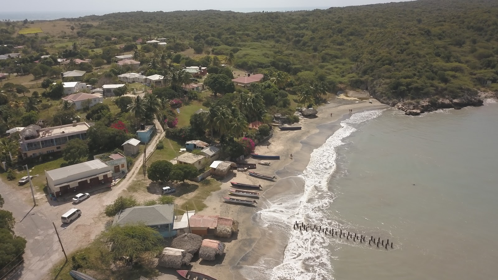 Foto van Treasure Beach met ruim strand