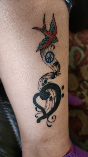 Explore tattoo letters ideas, creative tattoo ideas in Merrick, available at Three Kings Tattoo Long Island