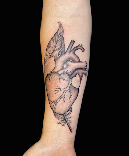 Explore flower tattoo ideas arm, creative tattoo ideas in Charleston, available at The Edge Tattoo Studio