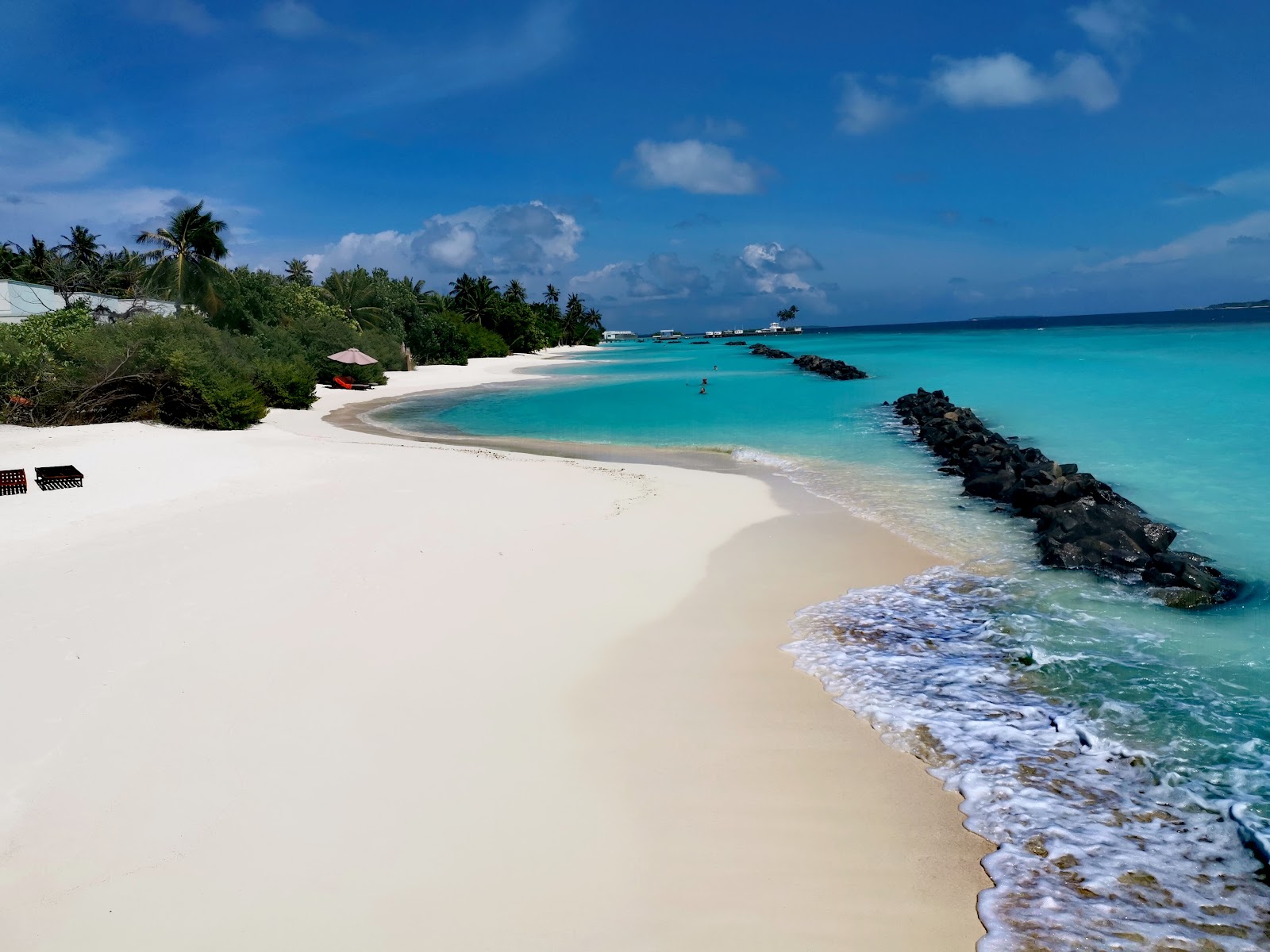 Foto van Strand van Dhigali Island met helder fijn zand oppervlakte
