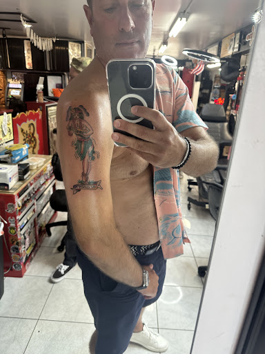 Explore cover up neck tattoo ideas, creative tattoo ideas in Honolulu, available at Sacred Art Tattoo Waikiki