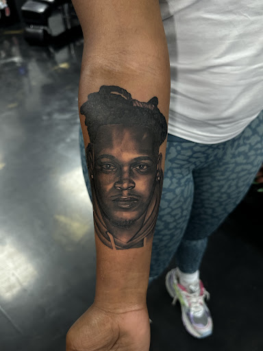 Explore female spine tattoo ideas, creative tattoo ideas in Stockbridge, available at Black Rose Tattoo Collective