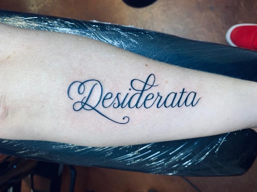 Explore banner tattoo ideas, creative tattoo ideas in Aledo, available at Elevated Tattoo & Piercing