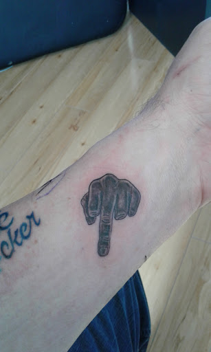 Explore left arm tattoo ideas, creative tattoo ideas in Homer, available at Exotic Eye Tattoo