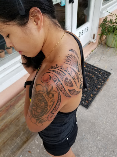 Explore lower back tattoo ideas, creative tattoo ideas in Savannah, available at Riverside Tattoo Parlor