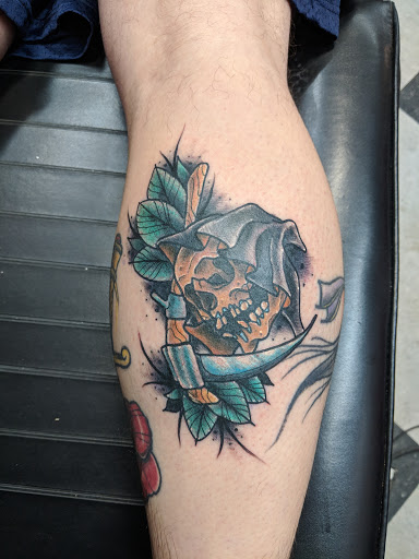 Explore black power tattoo ideas, creative tattoo ideas in Du Bois, available at Primitive Addiction Tattoo Studio