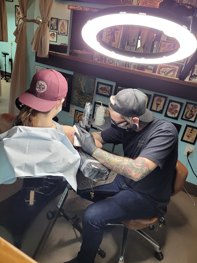 Explore mens western tattoo ideas, creative tattoo ideas in Johns Island, available at The Gilded Mermaid Tattoo Studio