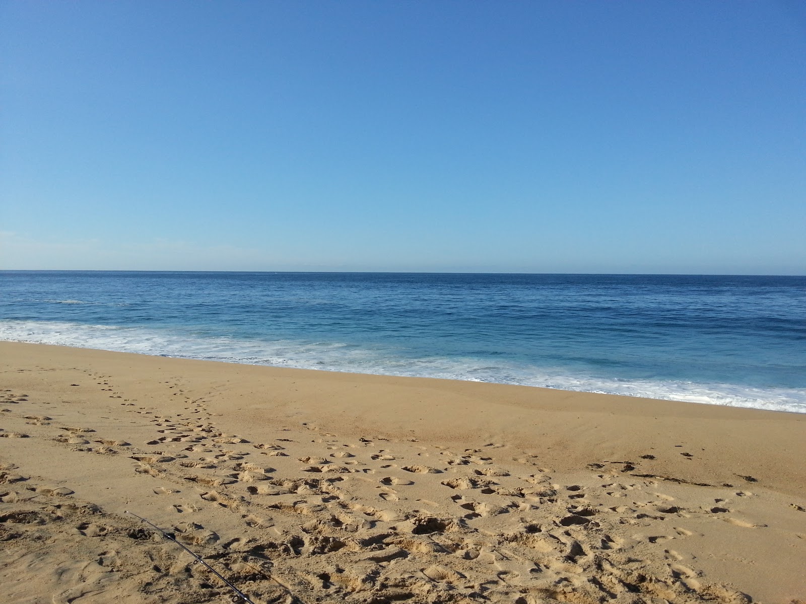 Fotografie cu Playa Mayto cu o suprafață de nisip beige
