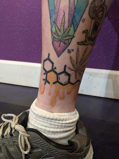 Explore cartoon tattoos ideas, creative tattoo ideas in Denver, available at Nocturnal Tattoo